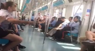 Metroda başörtülü kadına çirkin saldırı! ´Kara Fatma´ hakareti