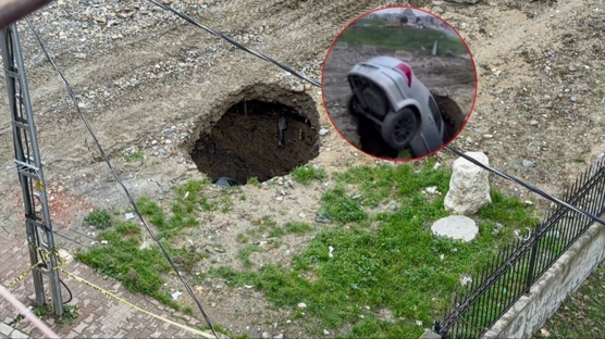 Park halindeki arac� �ukur yuttu! Sahibinin s�zleri �a��rtt�