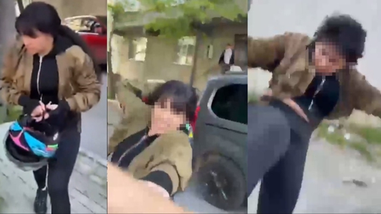 Eski kocas�n� sokak ortas�nda kaskla d�vd�! K�f�rler savuran kad�n�n sebebi hayrete u�ratt� 